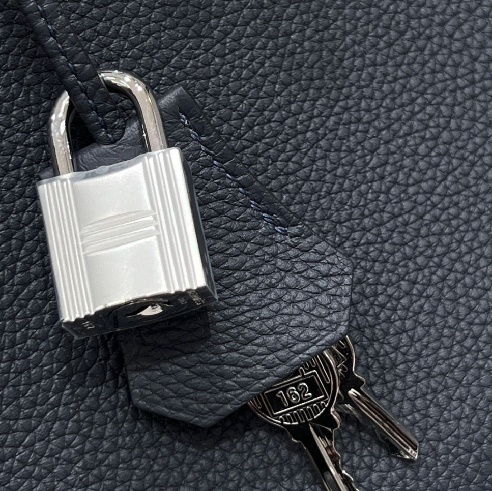 Birkin Retourne 25 handbag in Togo leather Black